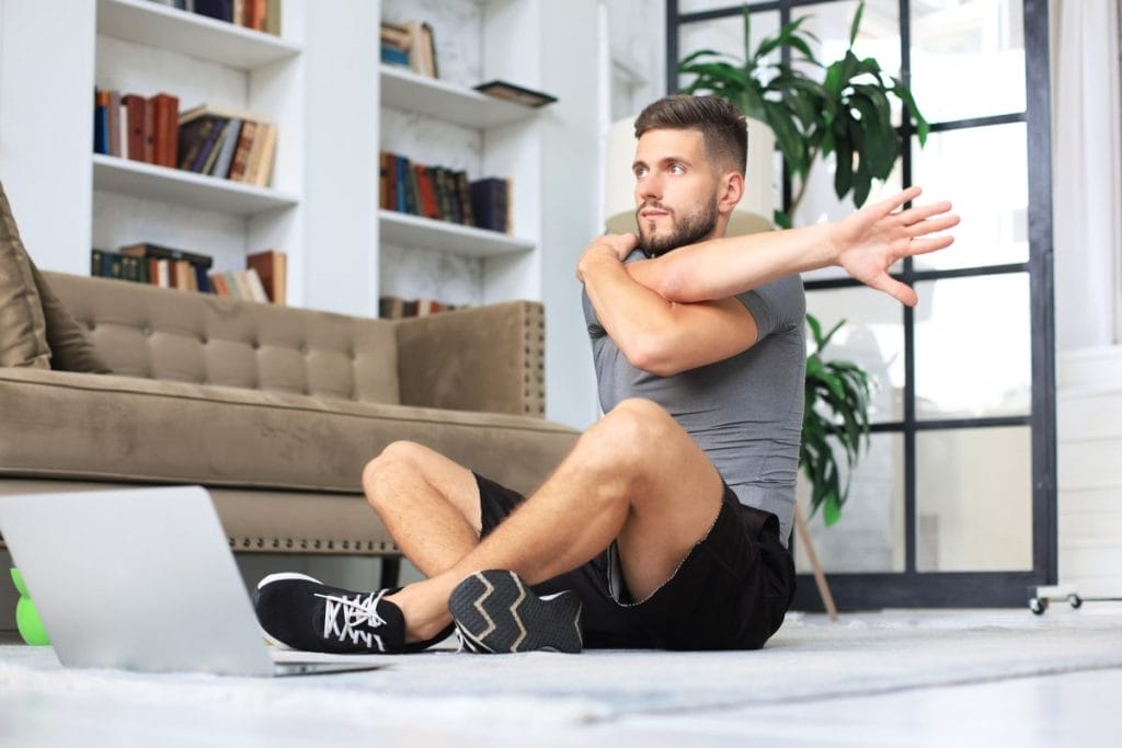 man on a yoga mat - home workout