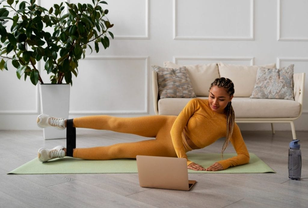 woman working out - home pull workout
