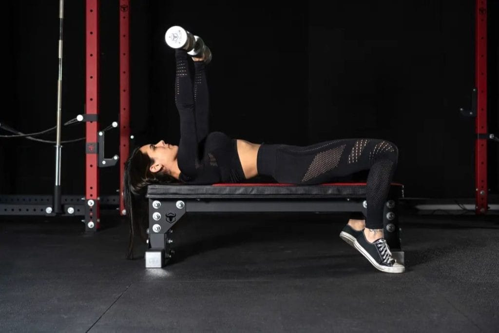 woman working out - At Home Bench Press Workouts