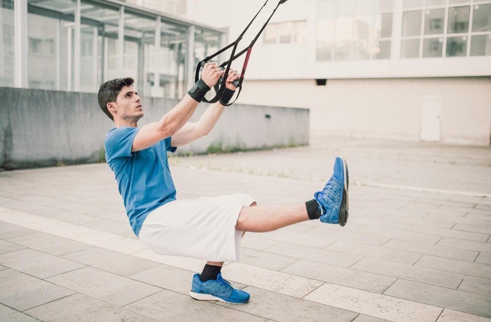 man working out - pulling workouts at home