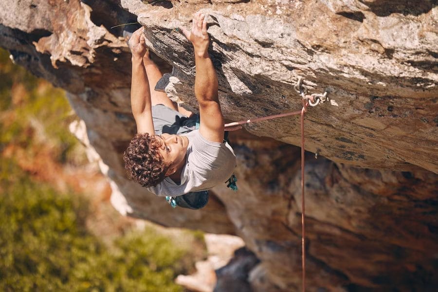 man rock climbing - at home climbing workouts